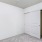 a room with white doors and carpet
