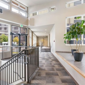 The essence of exceptional living a building with many windows and a walkway