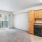 a kitchen with wooden cabinets