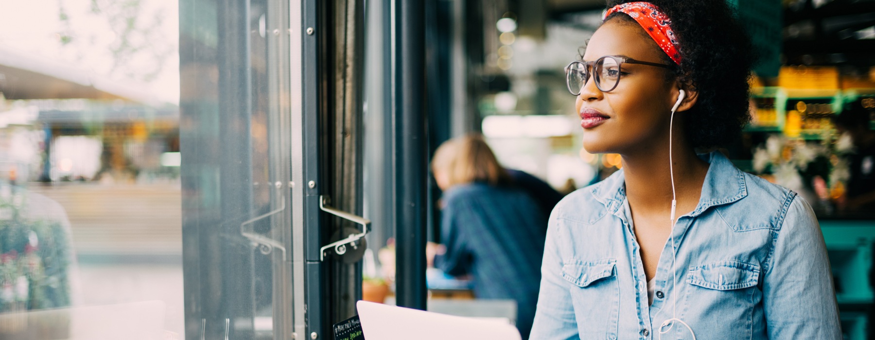 a woman working at a cafe